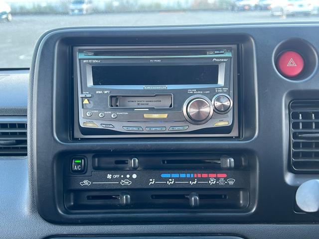 ハイゼットカーゴ クルーズターボ　ユーザー買取・カロッツェリアＣＤ・５速ミッション・ハイルーフ・ターボ車・前席ヘッドレスト別体シート・後席ヘッドレスト付分割シート・オーバーヘッドシェルフ・電格ドアミラー・全席パワーウィンドウ・ＡＢＳ（5枚目）