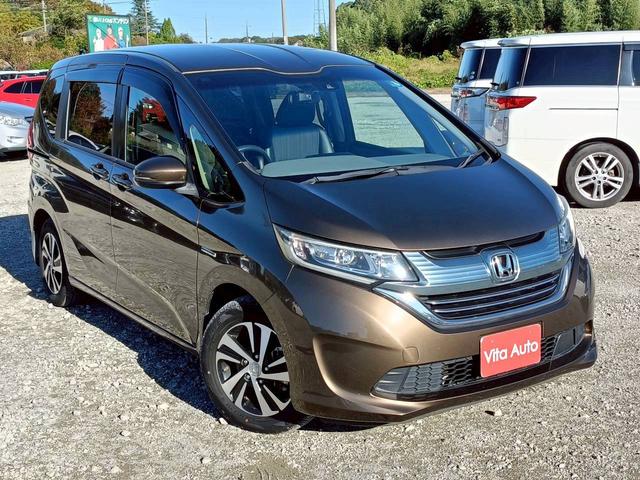 フリード＋ハイブリッド ハイブリッドＥＸ　メモリーナビ　フルセグＴＶ　リアカメラ　スマートキー　ＬＥＤヘッドライト　衝突軽減ブレーキ　両側パワスラ　前ドラレコ　シートヒーター　Ｂｌｕｅｔｏｏｔｈ　ＡＣＣ　純正１５インチアルミ　ＥＴＣ（2枚目）