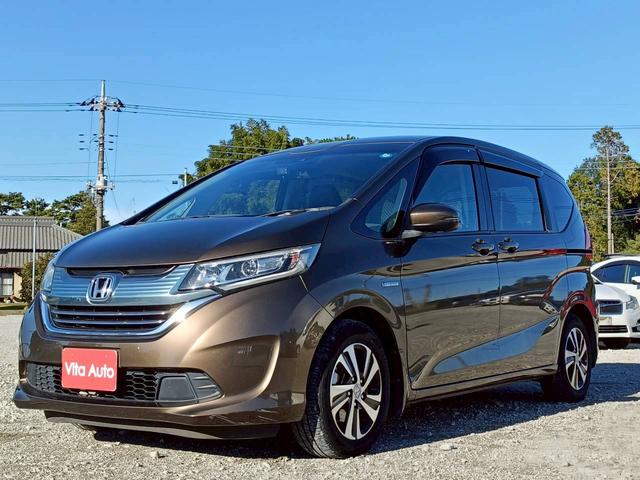 フリード＋ハイブリッド ハイブリッドＥＸ　メモリーナビ　フルセグＴＶ　リアカメラ　スマートキー　ＬＥＤヘッドライト　衝突軽減ブレーキ　両側パワスラ　前ドラレコ　シートヒーター　Ｂｌｕｅｔｏｏｔｈ　ＡＣＣ　純正１５インチアルミ　ＥＴＣ（6枚目）