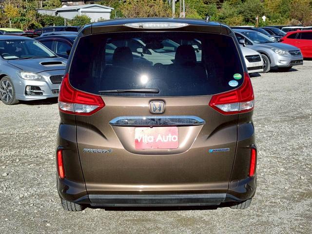 フリード＋ハイブリッド ハイブリッドＥＸ　メモリーナビ　フルセグＴＶ　リアカメラ　スマートキー　ＬＥＤヘッドライト　衝突軽減ブレーキ　両側パワスラ　前ドラレコ　シートヒーター　Ｂｌｕｅｔｏｏｔｈ　ＡＣＣ　純正１５インチアルミ　ＥＴＣ（11枚目）