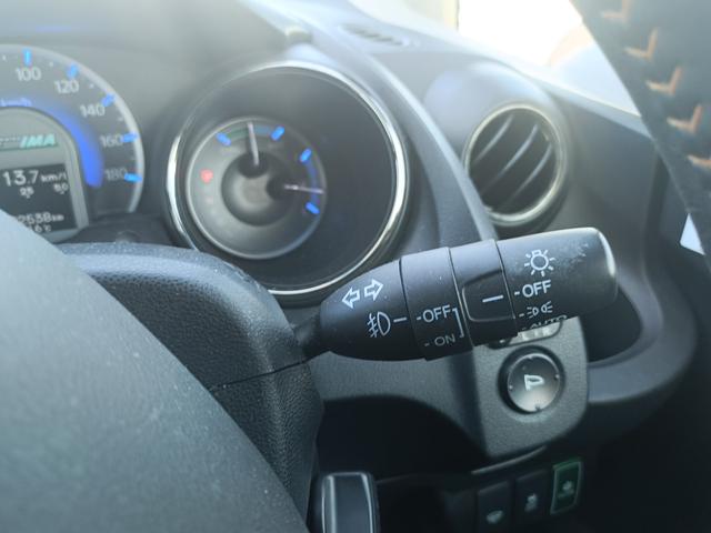 フィットシャトルハイブリッド ハイブリッド・スマートセレクション　ＳＤナビ　ワンセグＴＶ　リアカメラ　スマートキー　ＨＩＤヘッドライト　クルコン　社外１５インチアルミ　ＥＴＣ（22枚目）