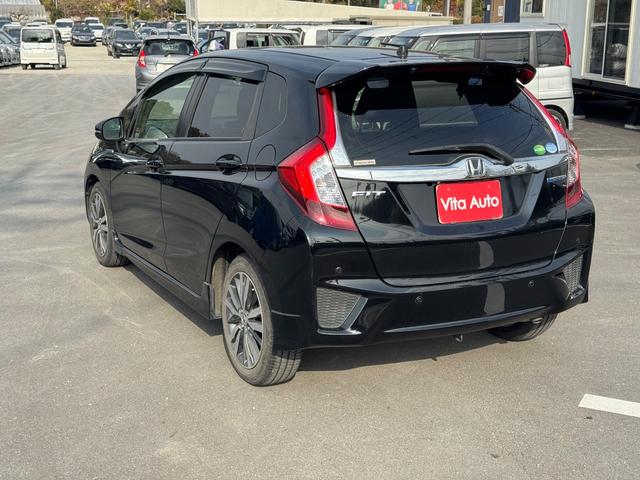 フィットハイブリッド Ｓパッケージ　メモリーナビ　フルセグＴＶ　リアカメラ　スマートキー　ＬＥＤヘッドライト　Ｂｌｕｅｔｏｏｔｈ　クルコン　純正１６インチアルミ（10枚目）