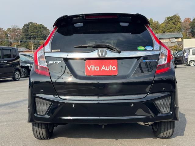 フィットハイブリッド Ｓパッケージ　メモリーナビ　フルセグＴＶ　リアカメラ　スマートキー　ＬＥＤヘッドライト　Ｂｌｕｅｔｏｏｔｈ　クルコン　純正１６インチアルミ（11枚目）