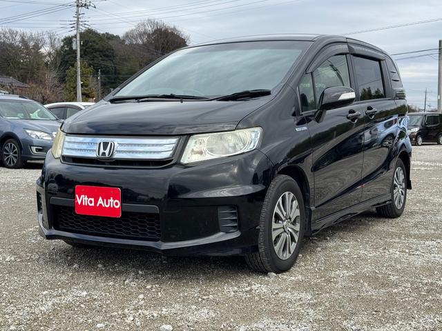 フリードスパイクハイブリッド ジャストセレクション メモリーナビ フルセグTV リアカメラ スマートキー HIDヘッドライト 両側パワスラ Bluetooth クルコン 純正15インチアルミ ETC(3枚目)