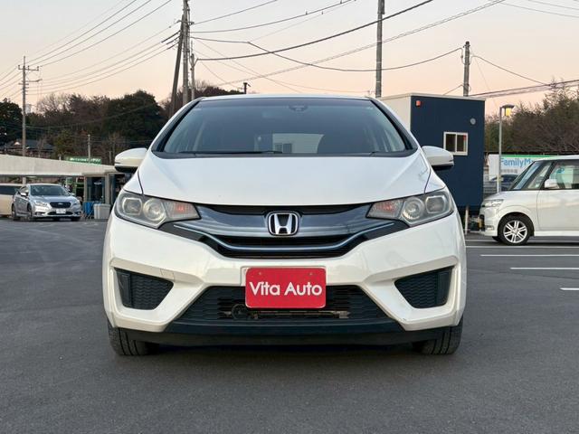 フィットハイブリッド Ｌパッケージ　メモリーナビ　フルセグＴＶ　リアカメラ　スマートキー　ＬＥＤヘッドライト　Ｂｌｕｅｔｏｏｔｈ　クルコン　社外１５インチアルミ　ＥＴＣ（4枚目）