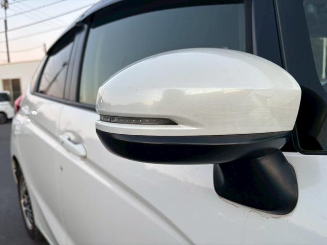 フィットハイブリッド Ｌパッケージ　メモリーナビ　フルセグＴＶ　リアカメラ　スマートキー　ＬＥＤヘッドライト　Ｂｌｕｅｔｏｏｔｈ　クルコン　社外１５インチアルミ　ＥＴＣ（15枚目）