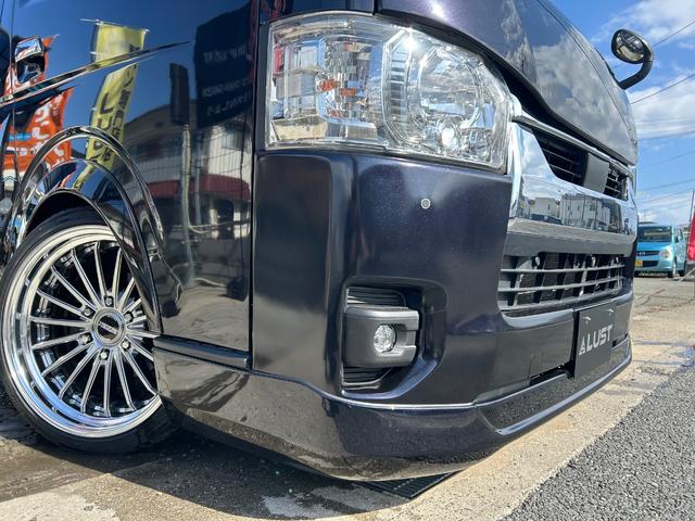 ハイエースバン スーパーGL ダークプライムII 令和3年式・61000km・新品ホイール・EF-19・バッドパネル・ローダウン・フロントスポイラー・シートカバー・7インチナビ・バックカメラ・ETC車載器・車中泊ベッドキット・無償保証(26枚目)