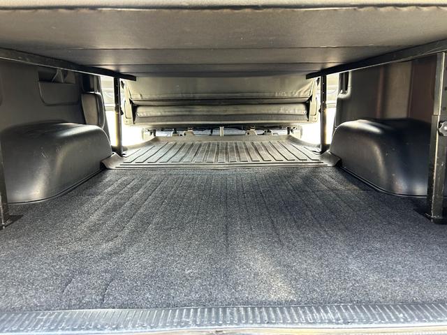 ハイエースバン スーパーＧＬ　ダークプライムＩＩ　カスタムカー・令和５年式・４００００ｋｍ・ＥＳＳＥＸバッドパネル・フロントスポイラー・ファブレスホイール・ローダウン・７インチナビゲーション・フルセグＴＶ・ＥＴＣ・バックカメラ・ベッドキット・車中泊（58枚目）