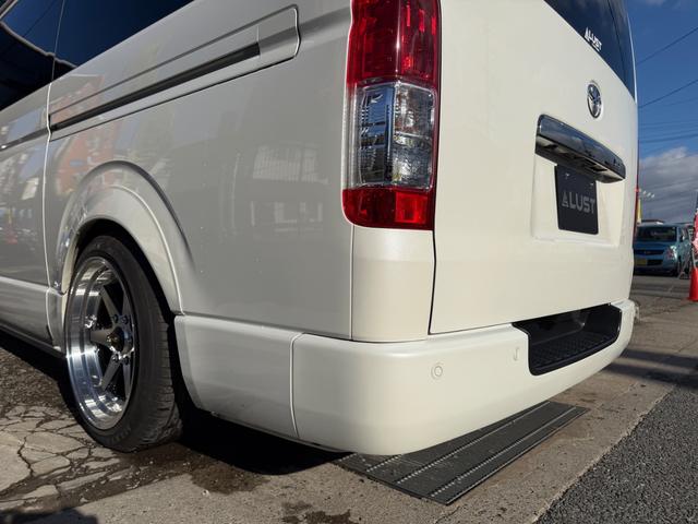 ハイエースバン スーパーＧＬ　ダークプライムＩＩ　カスタムカー・１０インチフローティングナビ・フルセグＴＶ・Ｂｌｕｅｔｏｏｔｈ・ＥＴＣ・ＥＳＳＥＸバッドパネル・フロントスポイラー・オーバーフェンダー・ローダウン・ホイール・タイヤ・車中泊ベッドキット（64枚目）
