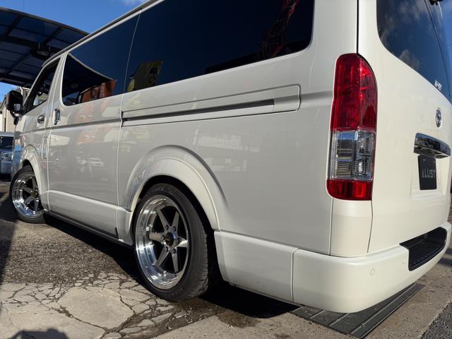 ハイエースバン スーパーＧＬ　ダークプライムＩＩ　カスタムカー・１０インチフローティングナビ・フルセグＴＶ・Ｂｌｕｅｔｏｏｔｈ・ＥＴＣ・ＥＳＳＥＸバッドパネル・フロントスポイラー・オーバーフェンダー・ローダウン・ホイール・タイヤ・車中泊ベッドキット（68枚目）