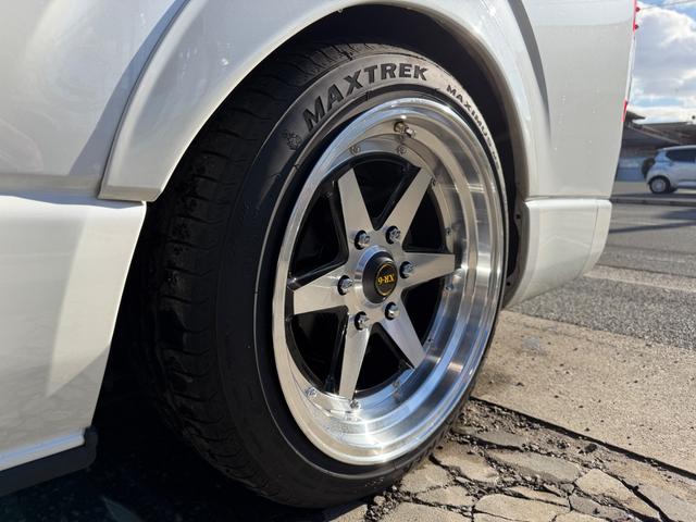 ハイエースバン スーパーＧＬ　ダークプライムＩＩ　カスタムカー・１０インチフローティングナビ・フルセグＴＶ・Ｂｌｕｅｔｏｏｔｈ・ＥＴＣ・ＥＳＳＥＸバッドパネル・フロントスポイラー・オーバーフェンダー・ローダウン・ホイール・タイヤ・車中泊ベッドキット（75枚目）