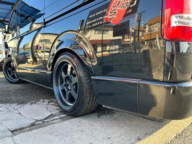 ハイエースバン スーパーＧＬ　ダークプライムＩＩ　カスタムカー・アルパイン１１インチＢＩＧ　Ｘナビ・リアモニター・天井スピーカー・高音質・バッドパネル・モデリスタエアロ・新品ホイール・タイヤ・ローダウン・車中泊ベッドキット・１２カ月無償保証（73枚目）