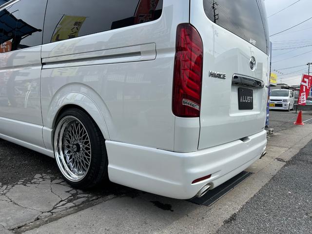 ハイエースバン スーパーGL ダークプライムII カスタムカー・フローティングナビ・大画面・HDMI・バックカメラ・ETC・ESSEXフロントスポイラー・サイドライナー・リアバンパー・オーバーフェンダー・シートカバー・車中泊ベッドキット・1年無償保証(68枚目)