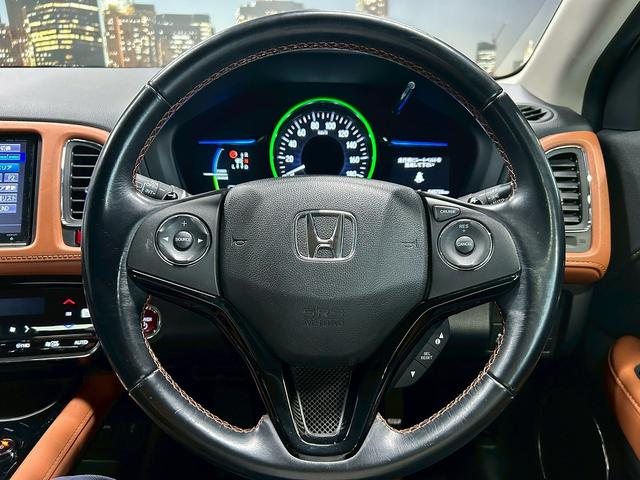 ヴェゼル ハイブリッドＺ　（禁煙車）（純正ＳＤナビ）（半黒革シート）（パドルシフト）（バックカメラ）（クルコン）（スマートキー）（ＬＥＤヘッドライト）（コーナーセンサ）（シートヒーター）（フルセグ）（純正１７インチＡＷ）（31枚目）