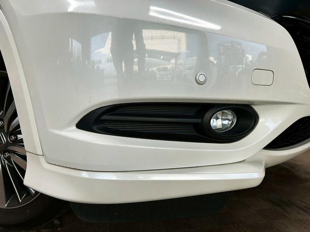 ヴェゼル ハイブリッドＺ　（禁煙車）（純正ＳＤナビ）（半黒革シート）（パドルシフト）（バックカメラ）（クルコン）（スマートキー）（ＬＥＤヘッドライト）（コーナーセンサ）（シートヒーター）（フルセグ）（純正１７インチＡＷ）（65枚目）