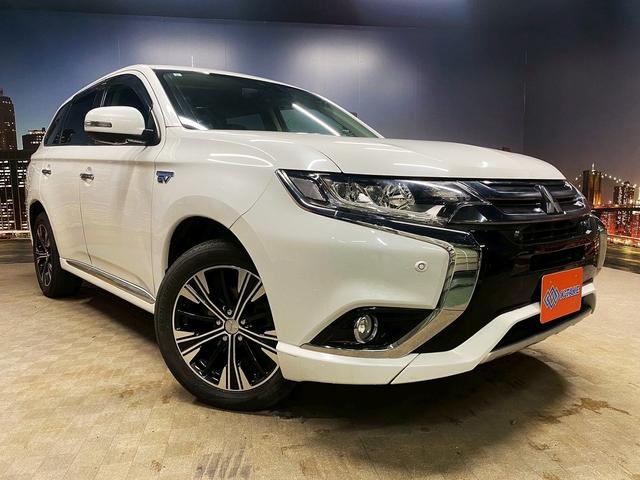 アウトランダーPHEV Gナビパッケージ (禁煙車)(後期型)(4WD)(黒半革)(純正SDナビ)(バックカメラ)(LEDヘッドライト)(クリアランスソナー)(パドルシフト)(パワーシート)(シートヒーター)(ETC)(純正18インチAW)(23枚目)