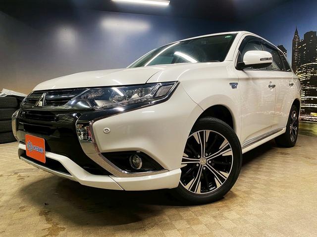 アウトランダーPHEV Gナビパッケージ (禁煙車)(後期型)(4WD)(黒半革)(純正SDナビ)(バックカメラ)(LEDヘッドライト)(クリアランスソナー)(パドルシフト)(パワーシート)(シートヒーター)(ETC)(純正18インチAW)(24枚目)