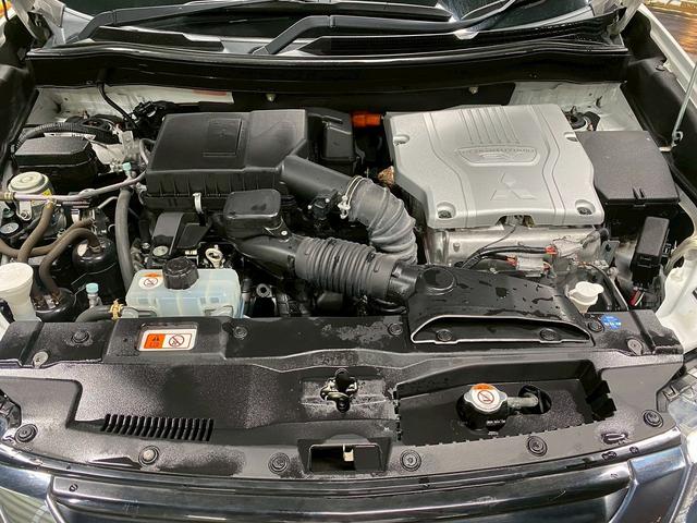 アウトランダーPHEV Gナビパッケージ (禁煙車)(後期型)(4WD)(黒半革)(純正SDナビ)(バックカメラ)(LEDヘッドライト)(クリアランスソナー)(パドルシフト)(パワーシート)(シートヒーター)(ETC)(純正18インチAW)(55枚目)