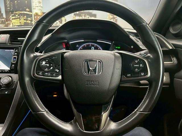 シビック ハッチバック (禁煙車)(6速MT)(黒半革)(ホンダセンシング)(純正SDナビ)(LEDヘッドライト)(フロントフォグ)(バックカメラ)(プッシュスタート&スマートキー)(パワーシート)(純正18インチAW)(26枚目)