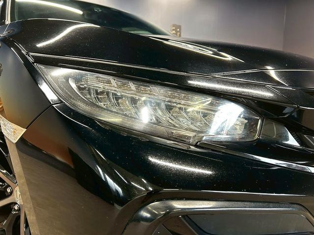 シビック ハッチバック (禁煙車)(6速MT)(黒半革)(ホンダセンシング)(純正SDナビ)(LEDヘッドライト)(フロントフォグ)(バックカメラ)(プッシュスタート&スマートキー)(パワーシート)(純正18インチAW)(56枚目)