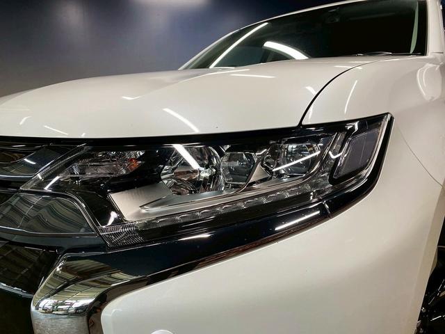 アウトランダーPHEV Gナビパッケージ (禁煙車)(4WD)(純正SDナビ)(全周囲カメラ)(黒半革)(レーダークルーズ)(LEDヘッドライト)(クリアランスソナー)(パワーシート)(シートヒーター)(パドルシフト)(純正18インチAW)(20枚目)