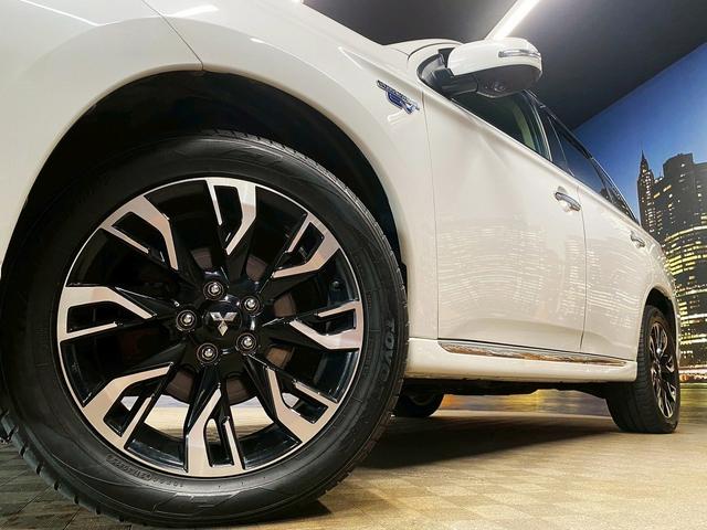 アウトランダーPHEV Gナビパッケージ (禁煙車)(4WD)(純正SDナビ)(全周囲カメラ)(黒半革)(レーダークルーズ)(LEDヘッドライト)(クリアランスソナー)(パワーシート)(シートヒーター)(パドルシフト)(純正18インチAW)(21枚目)