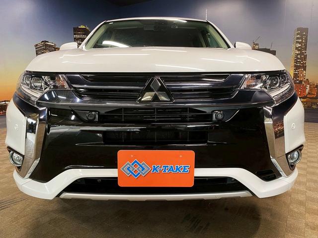 アウトランダーPHEV Gナビパッケージ (禁煙車)(4WD)(純正SDナビ)(全周囲カメラ)(黒半革)(レーダークルーズ)(LEDヘッドライト)(クリアランスソナー)(パワーシート)(シートヒーター)(パドルシフト)(純正18インチAW)(23枚目)