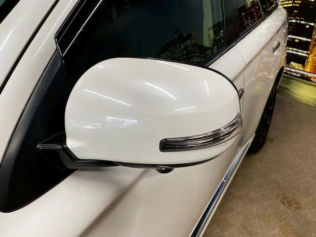 アウトランダーPHEV Gナビパッケージ (禁煙車)(4WD)(純正SDナビ)(全周囲カメラ)(黒半革)(レーダークルーズ)(LEDヘッドライト)(クリアランスソナー)(パワーシート)(シートヒーター)(パドルシフト)(純正18インチAW)(31枚目)