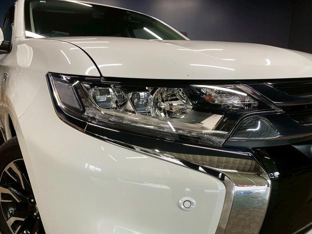 アウトランダーPHEV Gナビパッケージ (禁煙車)(4WD)(純正SDナビ)(全周囲カメラ)(黒半革)(レーダークルーズ)(LEDヘッドライト)(クリアランスソナー)(パワーシート)(シートヒーター)(パドルシフト)(純正18インチAW)(62枚目)
