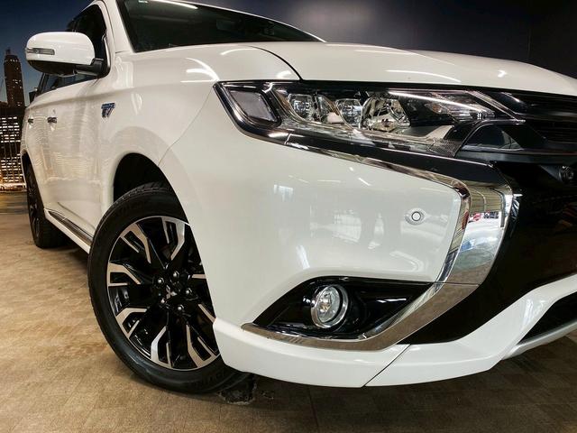 アウトランダーPHEV Gナビパッケージ (禁煙車)(4WD)(純正SDナビ)(全周囲カメラ)(黒半革)(レーダークルーズ)(LEDヘッドライト)(クリアランスソナー)(パワーシート)(シートヒーター)(パドルシフト)(純正18インチAW)(66枚目)