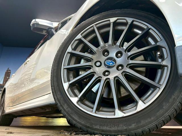 レヴォーグ １．６ＳＴＩスポーツアイサイト　アドバンスセーフティパッケージ　（禁煙車）（４ＷＤ）（赤茶本革シート）（ＳＴＩエアロ）（レーダークルーズ）（メーカーＳＤナビ）（パドルシフト）（バック＆サイドカメラ）（ＥＴＣ）（純正１８インチＡＷ）（18枚目）