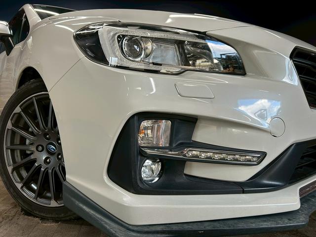 レヴォーグ １．６ＳＴＩスポーツアイサイト　アドバンスセーフティパッケージ　（禁煙車）（４ＷＤ）（赤茶本革シート）（ＳＴＩエアロ）（レーダークルーズ）（メーカーＳＤナビ）（パドルシフト）（バック＆サイドカメラ）（ＥＴＣ）（純正１８インチＡＷ）（63枚目）