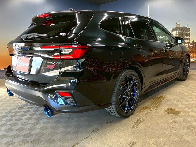 レヴォーグ ＳＴＩスポーツ　（禁煙車）（ワンオーナー）（赤＆黒本革シート）（純正９インチナビ）（ガナドール製マフラー）（ａｐｐｌｅ　ＣａｒＰｌａｙ）（アイサイト）（レーダークルーズ）（ＥＴＣ）（ＷｅｄｓＳｐｏｒｔ１８インチＡＷ）（23枚目）