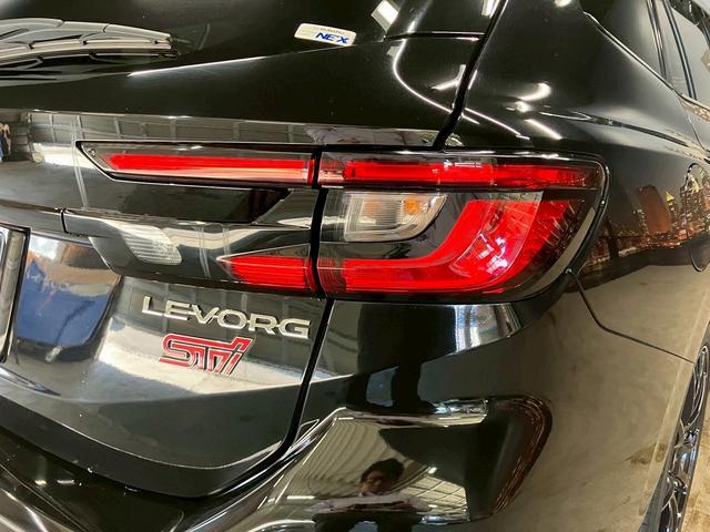 レヴォーグ ＳＴＩスポーツ　（禁煙車）（ワンオーナー）（赤＆黒本革シート）（純正９インチナビ）（ガナドール製マフラー）（ａｐｐｌｅ　ＣａｒＰｌａｙ）（アイサイト）（レーダークルーズ）（ＥＴＣ）（ＷｅｄｓＳｐｏｒｔ１８インチＡＷ）（34枚目）