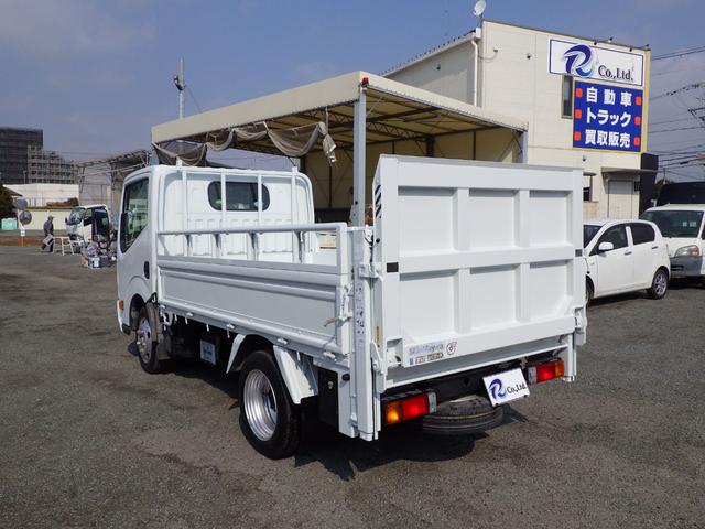 アトラストラック 平・垂直PG・積載2t・全低床・AT・ディーゼル 荷台内寸304×156×63 車両外寸469×169×199 車両総重量5t未満 新明和製PG 昇降能力600kg 準中型免許 4ナンバー エンジン型式 ZD30 3000cc 普通 トラック(2枚目)