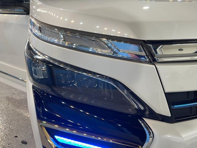 ヴォクシー ハイブリッドZS 煌III ワンオーナー車 モデリスタエアロパーツ アルパイン11インチナビ アルパインフリップダウンM フルセグ バックカメラ セーフティセンス 純正16インチAW LEDヘッド ハーフレザー シートヒーター(16枚目)
