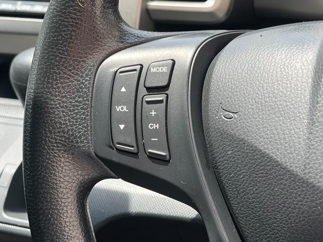 フリードスパイク Ｇ　ジャストセレクション　オートスライド　ナビＴＶ　ＨＩＤ　ＨＤＤナビ　地デジ　バックカメラ　パワースライドドア　スマートキー２個　ＨＩＤヘッドライト　リアスポイラー　オートライト　オートエアコン　オートライト　センターコンソールボックス　コーナーセンサー（31枚目）