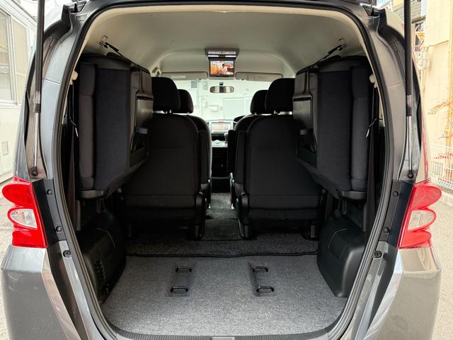 フリード Ｇ　Ｌパッケージ　天井モニター　左オートスライドドア　ＥＴＣ　天井モニター　左オートスライドドア　純正ナビ　ＴＶ　バックカメラ　ＥＴＣ　キーレス　ＨＩＤ　オートエアコン　ミラーウィンカー　ウオークスルー（13枚目）