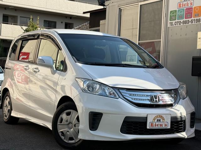 フリードハイブリッド ハイブリッド 後席モニター 両側自動 ナビTV BT再生 両側パワースライドドア スマートキー 純正ナビ フルセグTV バックカメラ Bluetooth再生 ETC HID クルーズコントロール 後席モニター オートライト オートエアコン ドラレコ(5枚目)