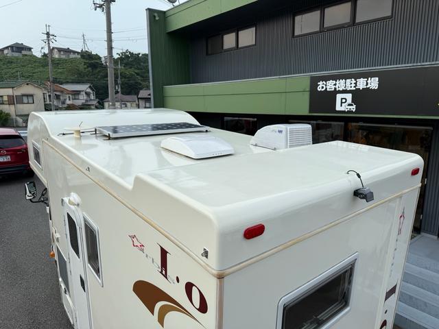 カムロード キャンピングワークス　オルビスイオ　発電機　家庭用エアコン　リチウムイオンバッテリー３００Ａ　２０００Ｗインバーター　ＦＦヒーター　温水ボイラー　温水シャワー　カセットトイレ　ソーラーパネル　クルーズコントロール　ＳＤナビ（35枚目）