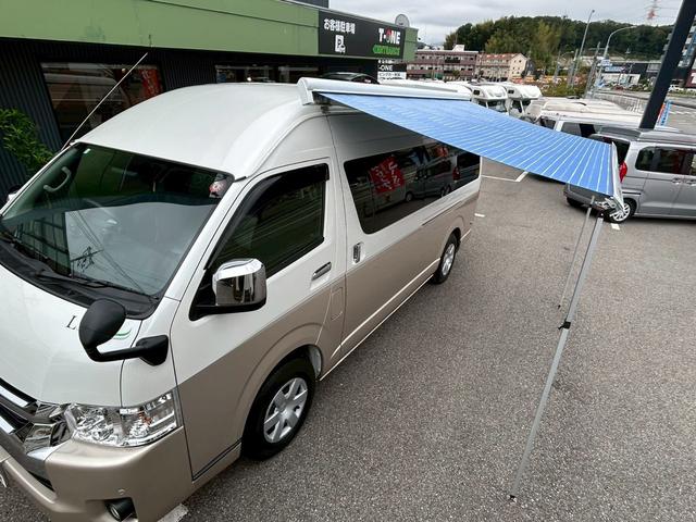 ハイエースバン ナッツRV リーク2 出窓仕様/常設ベッド/FFヒーター/1500Wインバーター/ツインサブバッテリー/マックスファン/サイドオーニング/ソーラーパネル/トヨタ安全先進装備/パノラミックビュー/コーナーセンサー/(35枚目)