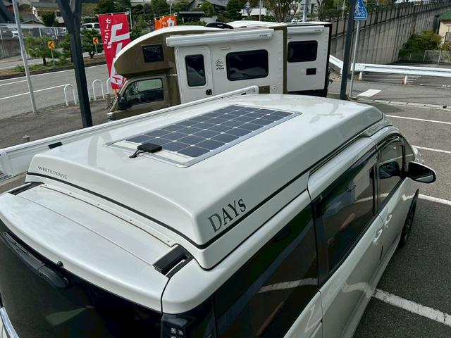 ヴォクシー ホワイトハウス　ＤＡＹＳ　ポップアップルーフ　スイベルシート（回転シート）／電動オーニング／サブバッテリー／電子レンジ／１５００Ｗインバーター／ＦＦヒーター／シンク／走行充電／外部電源／サブナビ切替スイッチ／セーフティーセンス／パワスラ／（32枚目）