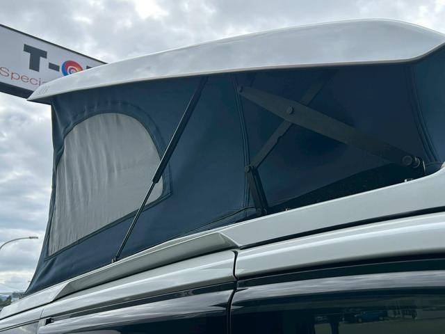 ヴォクシー ホワイトハウス　ＤＡＹＳ　ポップアップルーフ　スイベルシート（回転シート）／電動オーニング／サブバッテリー／電子レンジ／１５００Ｗインバーター／ＦＦヒーター／シンク／走行充電／外部電源／サブナビ切替スイッチ／セーフティーセンス／パワスラ／（35枚目）