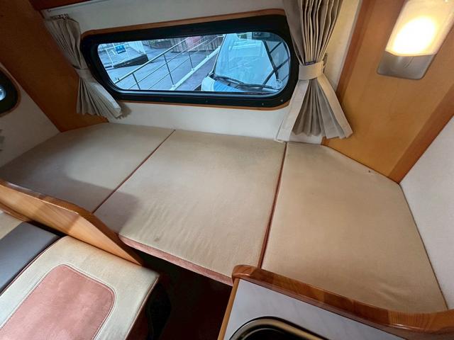 ライトエーストラック AZ-MAX エム・ホルーヴァ ポップアップ ライトキャブコン/常設リアベッド/FFヒーター/FFヒーター高地用スイッチ/1500Wインバーター/ツインサブバッテリー/シンク/冷蔵庫/サイドオーニング/走行充電/外部充電/外部電源/ナビ/ETC/(65枚目)