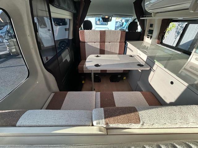 ハイエースバン キャンパー鹿児島 レムBV 家庭用エアコン/常設Wベッド/出窓仕様/CTEK走行充電器/FFヒーター/1500Wインバーター/トリプルサブBT/ソーラーパネル/マックスファン/電子レンジ/冷蔵庫/リアTV/純正Aw/TSS/(6枚目)