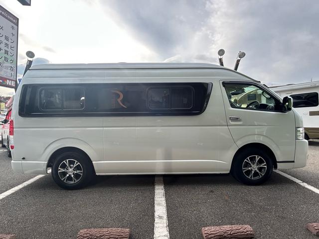 ハイエースバン キャンパー鹿児島 レムBV 家庭用エアコン/常設Wベッド/出窓仕様/CTEK走行充電器/FFヒーター/1500Wインバーター/トリプルサブBT/ソーラーパネル/マックスファン/電子レンジ/冷蔵庫/リアTV/純正Aw/TSS/(31枚目)