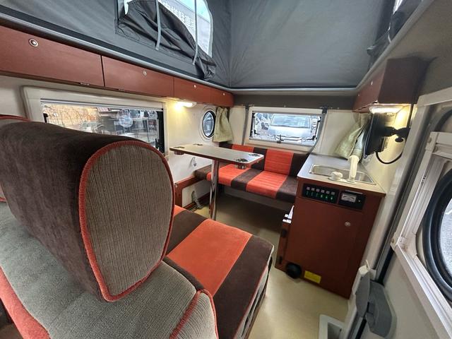 ハイゼットトラック 　ポップアップルーフ／二段ベッド／ＦＦヒーター／先進安全装備／スマートアシスト／１オーナー／外部充電／アウターシャワー／リアＴＶ／ナビサブ切替スイッチ／カロッツェリア製メモリーナビ／ＥＴＣ／（6枚目）