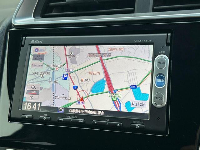 フィット １３Ｇ・Ｆパッケージ　純正ナビ　禁煙　バックカメラ　衝突軽減ブレーキ　誤発進抑制機能　アイドリングストップ　Ｂｌｕｅｔｏｏｔｈ再生　ＤＶＤ再生　地デジＴＶ　シートリフター　スマートキー　プッシュスタート　横滑り防止装置（21枚目）