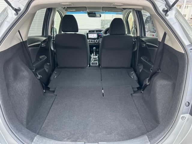 フィット １３Ｇ・Ｆパッケージ　純正ナビ　禁煙　バックカメラ　衝突軽減ブレーキ　誤発進抑制機能　アイドリングストップ　Ｂｌｕｅｔｏｏｔｈ再生　ＤＶＤ再生　地デジＴＶ　シートリフター　スマートキー　プッシュスタート　横滑り防止装置（38枚目）