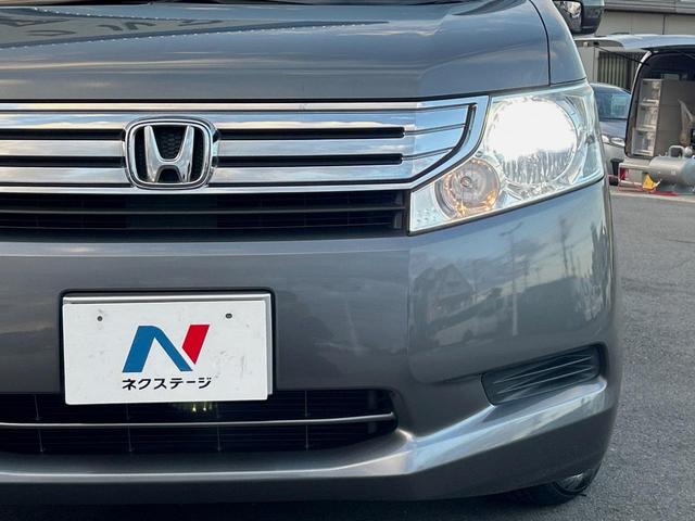 ステップワゴン L 純正ナビ 禁煙 両側電動スライドドア バックカメラ ETC HIDヘッドライト オートライト オートエアコン スマートキー ステアリングスイッチ シートリフター 盗難防止装置 フローリング(14枚目)